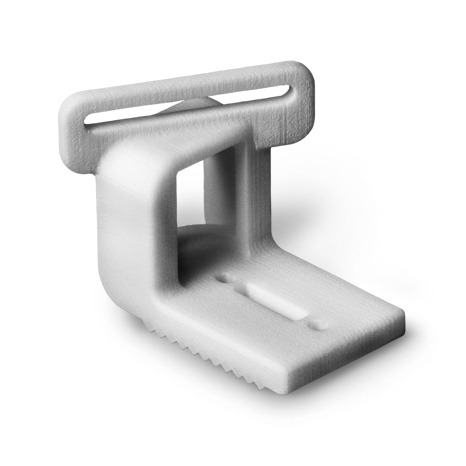 white nylon part built with sls